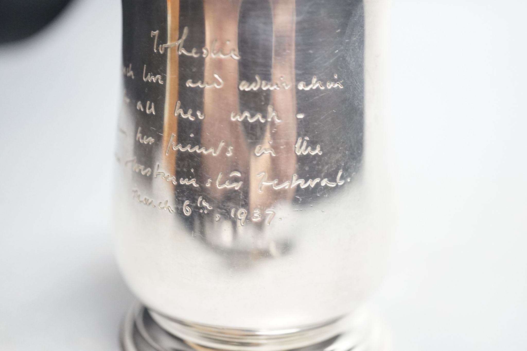 A Victorian silver christening mug, London, 1936, with engraved inscription, 89mm, 141 grams.